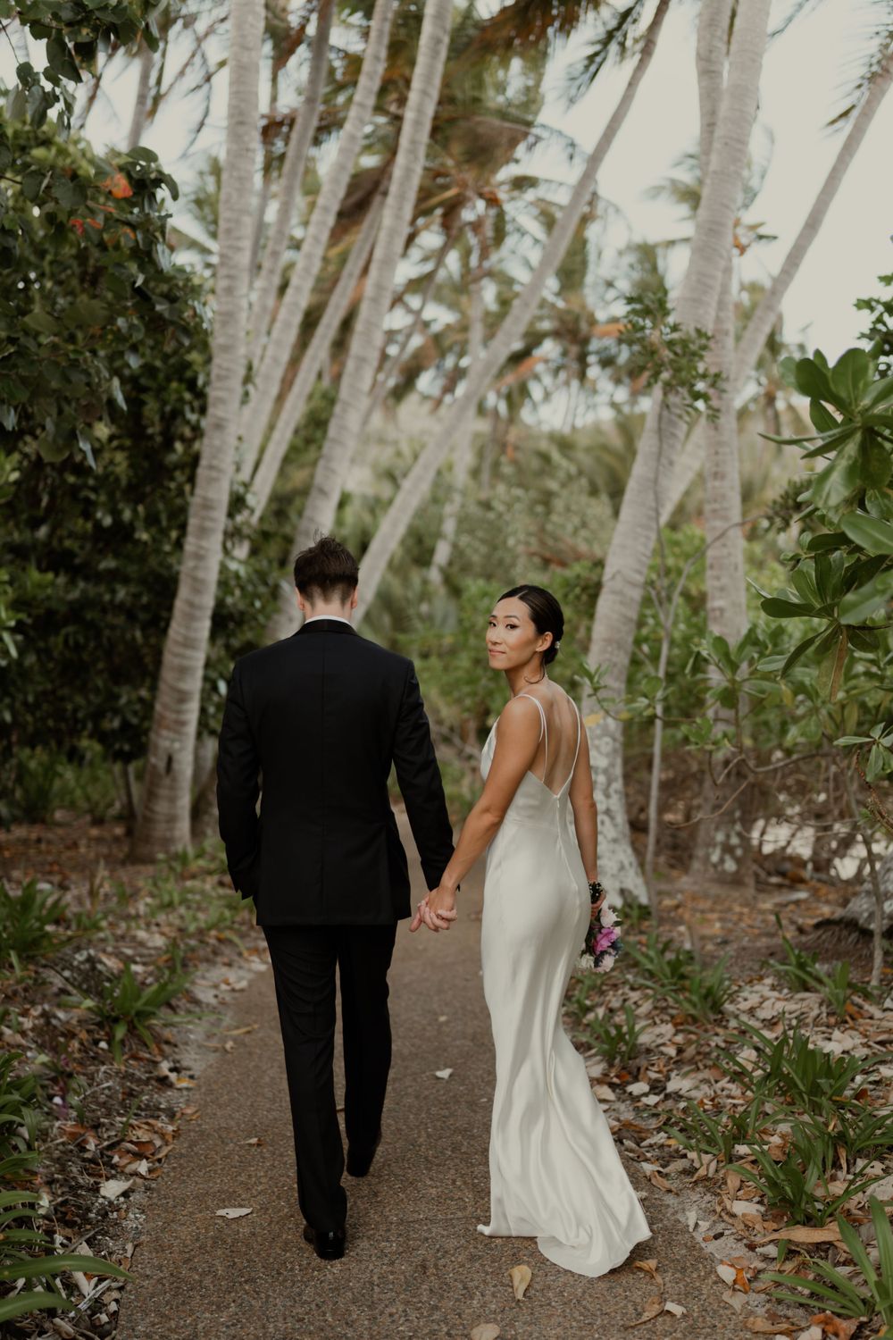 Couple photograph after eloping on Hayman Island, Whitsundays.