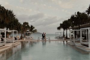 Wedding photography at Hayman Island infinite pool.