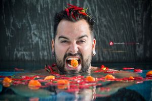 creative branding portrait for client on location, Windsor Ontario halo heat hot sauce