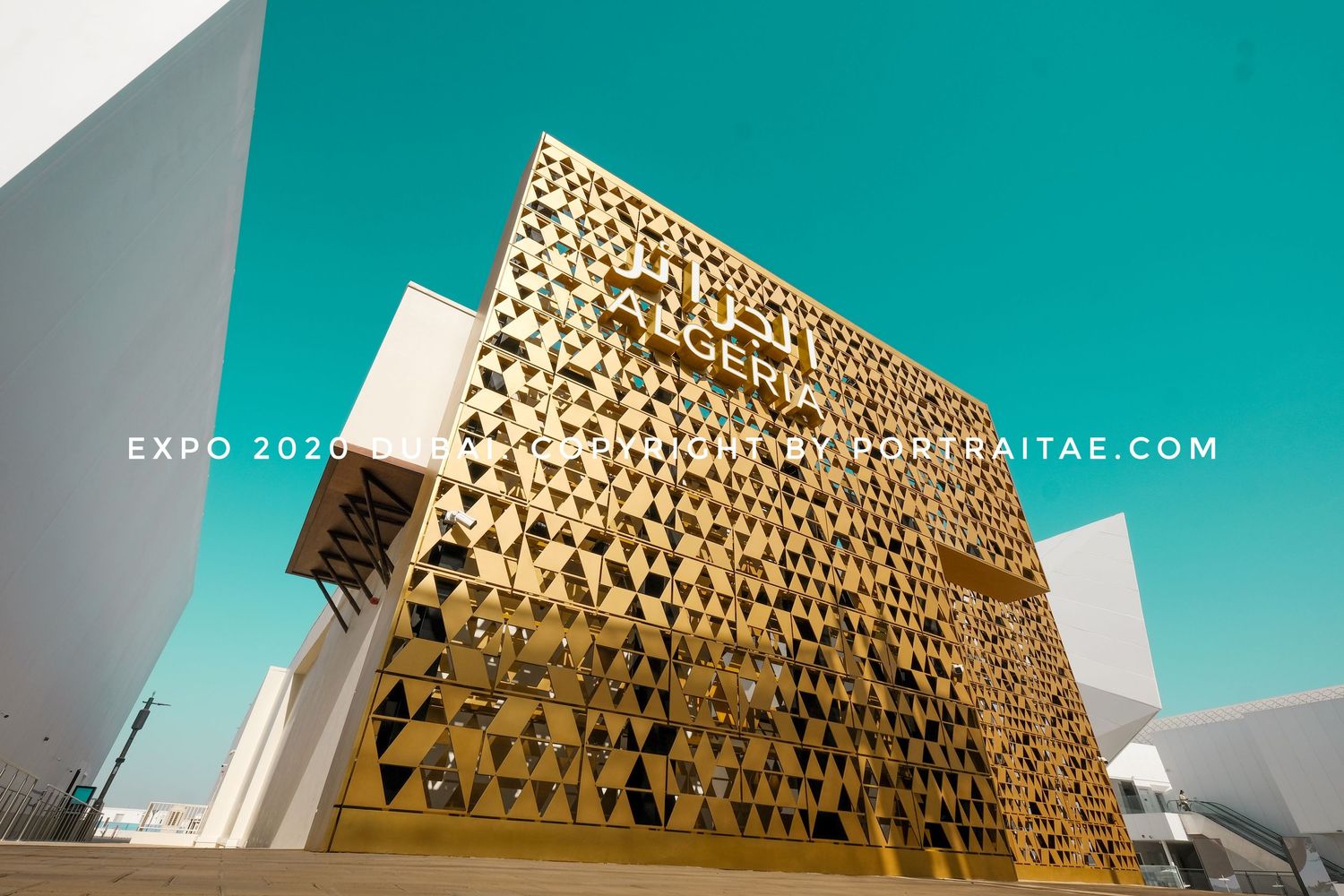 Algeria pavillion at expo 2020 dubai is shining in the golden hour with the blue sky