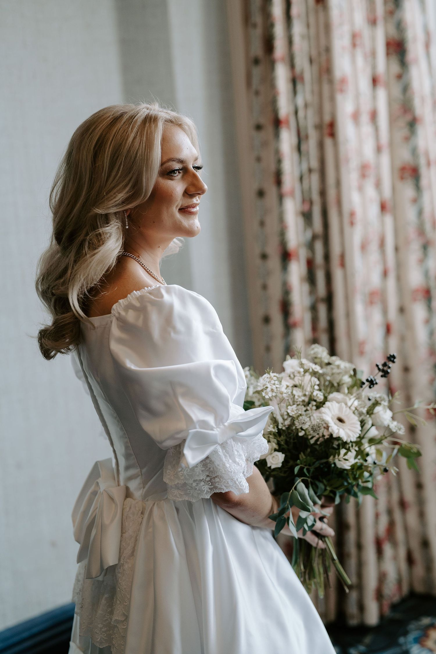 bride holding bouquet at the Randolph hotel in oxford