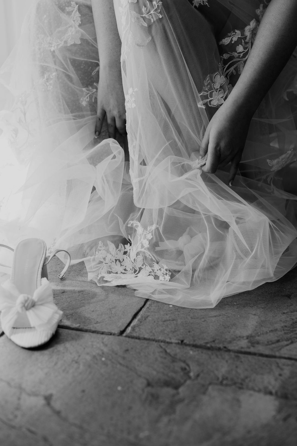 The wedding veil and shoes on the floor at Beaconside House