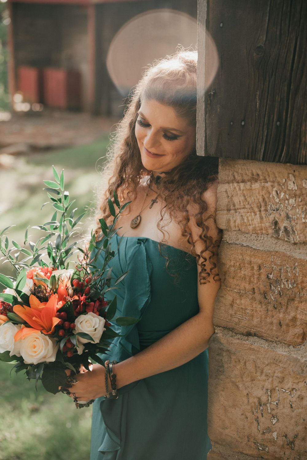 bride with flowers by Cowgill Cathy Flowers , LGBT fall wedding in Ohio