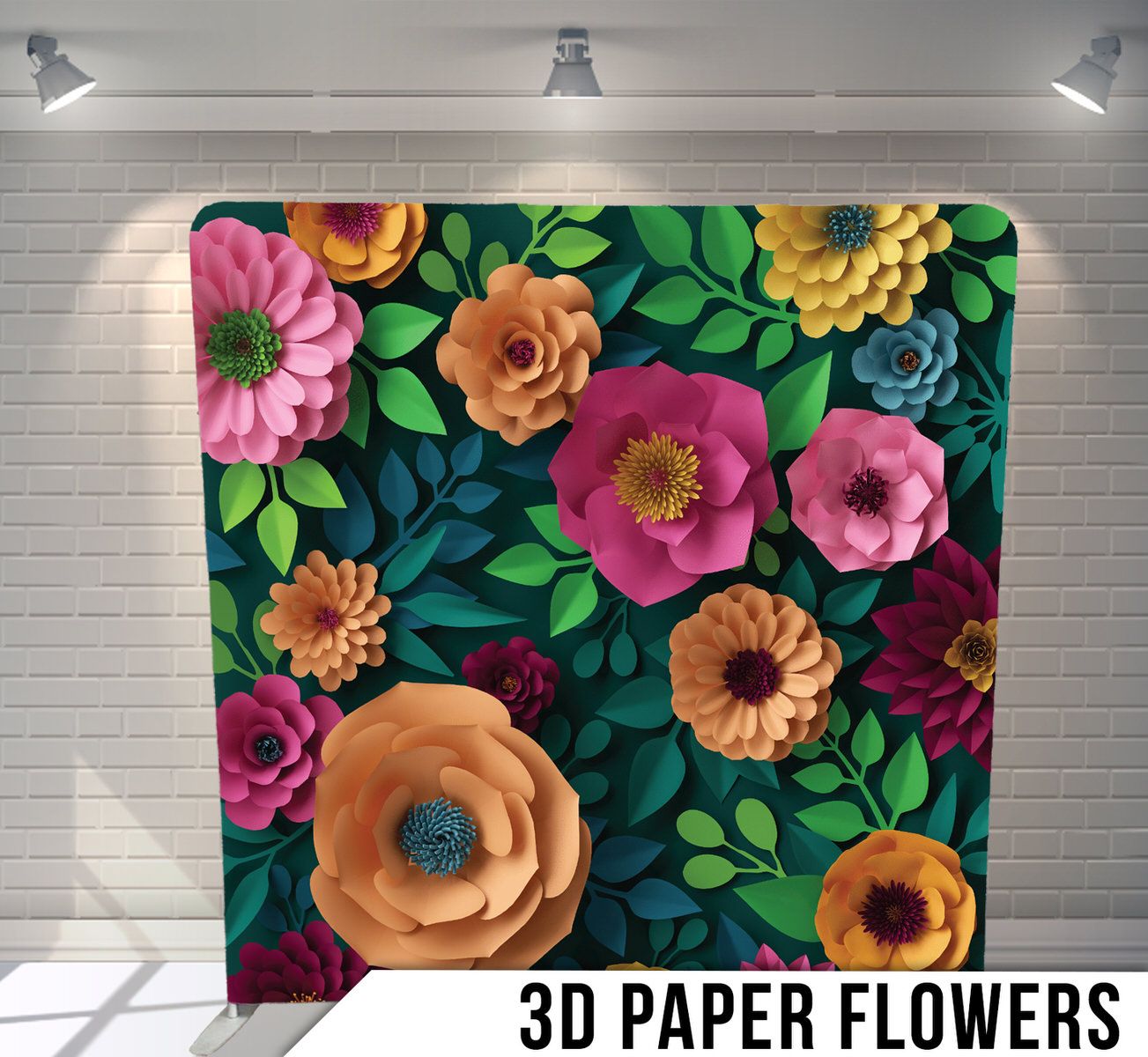 Vibrant 3D paper flowers in pink, orange, and blue with green leaves arranged on a dark background.