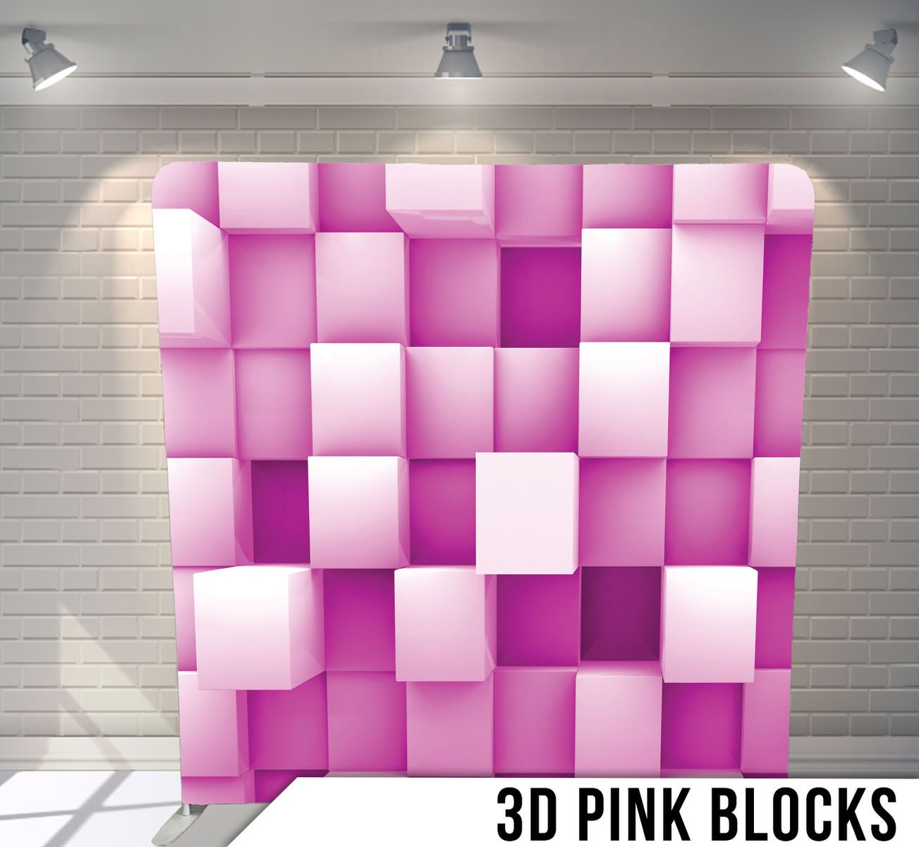 3D pink and white cubes arranged in a checkered pattern creating a geometric wall display.