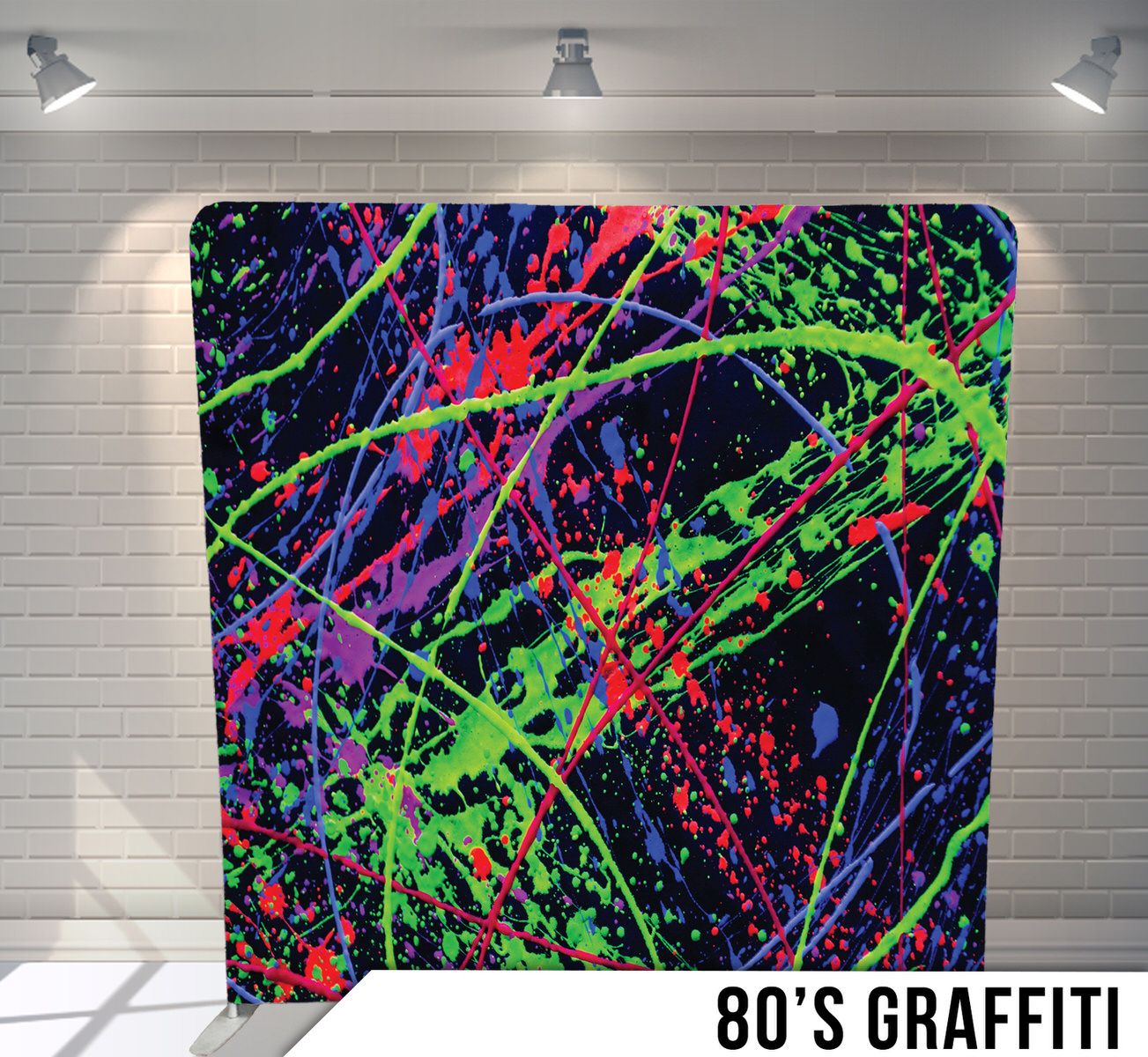 Vibrant paint splatter pattern in neon colors against black background creating graffiti effect.