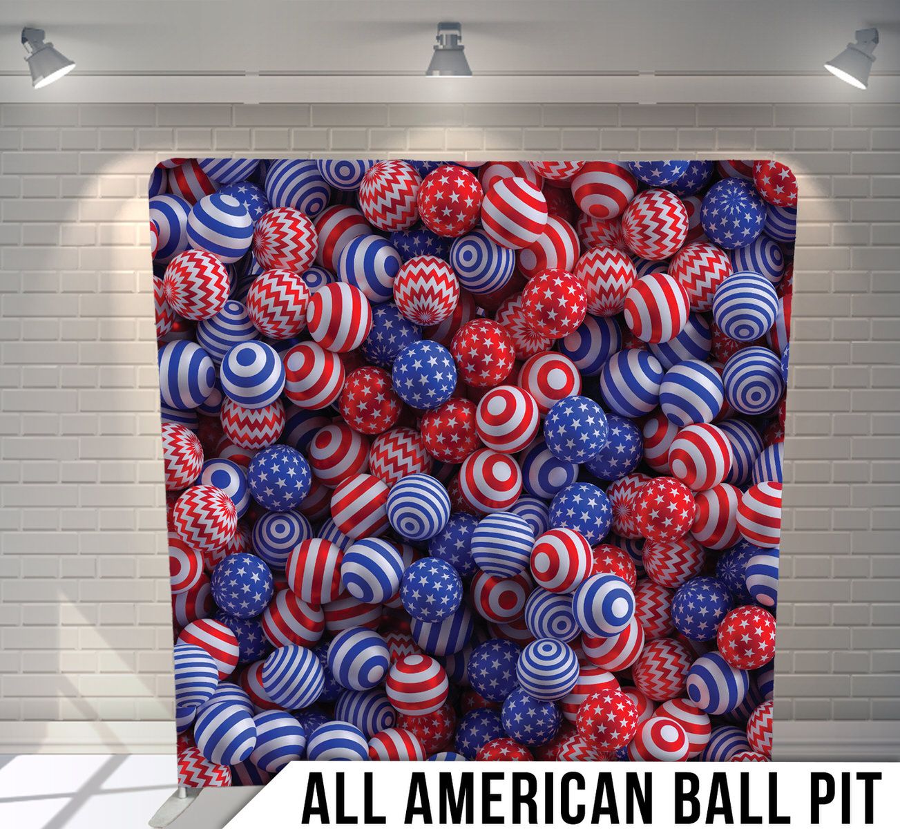 Red, white, and blue striped spherical balls forming a patriotic American-themed ball pit background.