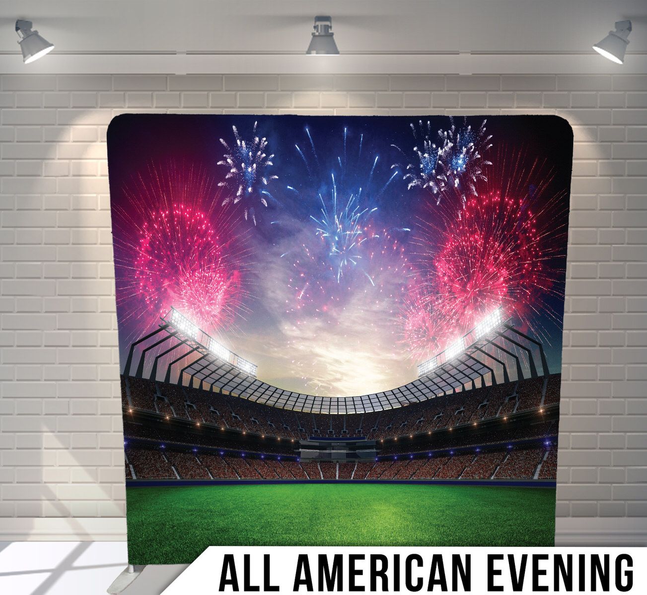 Stadium filled with colorful fireworks display illuminating the night sky over green sports field.