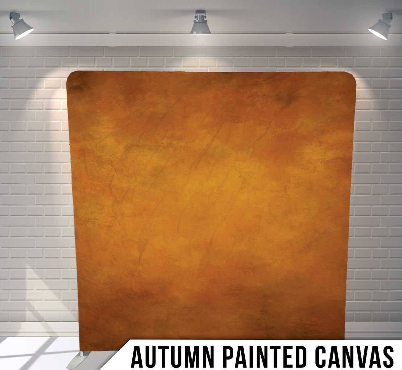 Textured orange-brown canvas backdrop with spotlight illumination for photography.