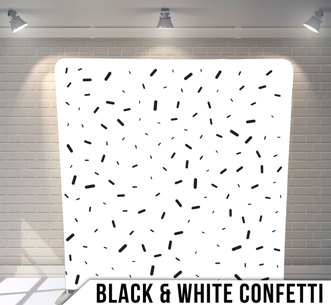 Random black rectangular shapes scattered on white background in a modern confetti pattern.