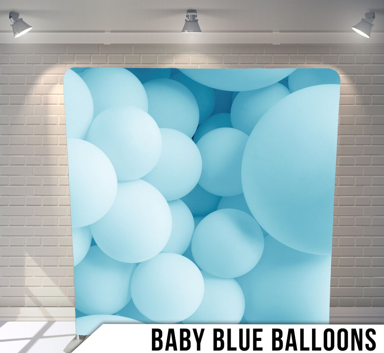 Light blue balloon arrangement creating a soft, dreamy backdrop for baby-themed events.