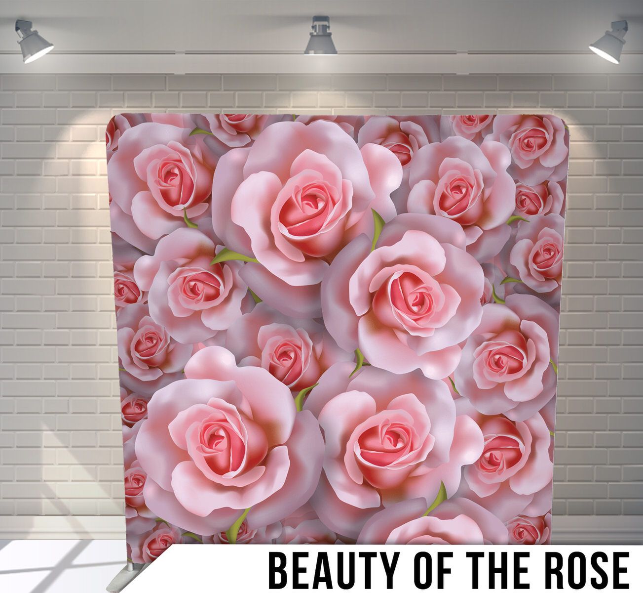 Romantic backdrop of pink roses arranged in a repeating pattern creating a soft floral wall.