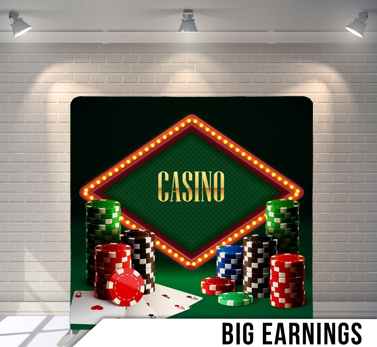 Casino themed backdrop with illuminated sign, poker chips, and playing cards on green felt table.