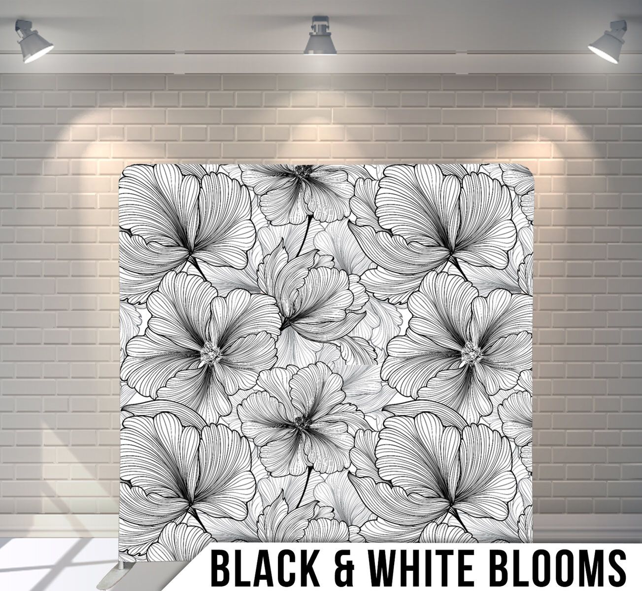Delicate black and white floral pattern featuring detailed line drawings of blooming flowers.