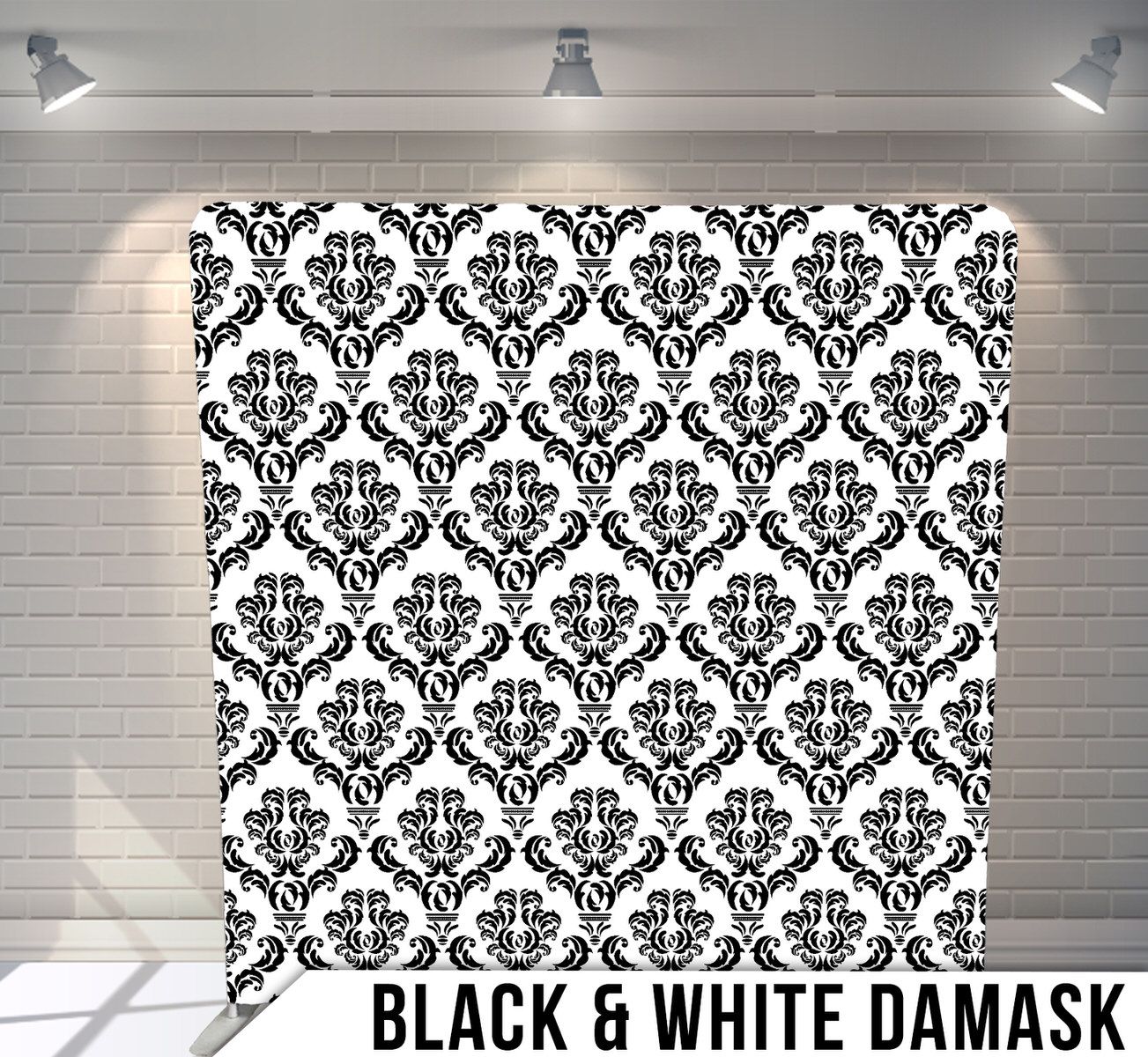 Classic black damask pattern on white background featuring ornate Victorian-style motifs.