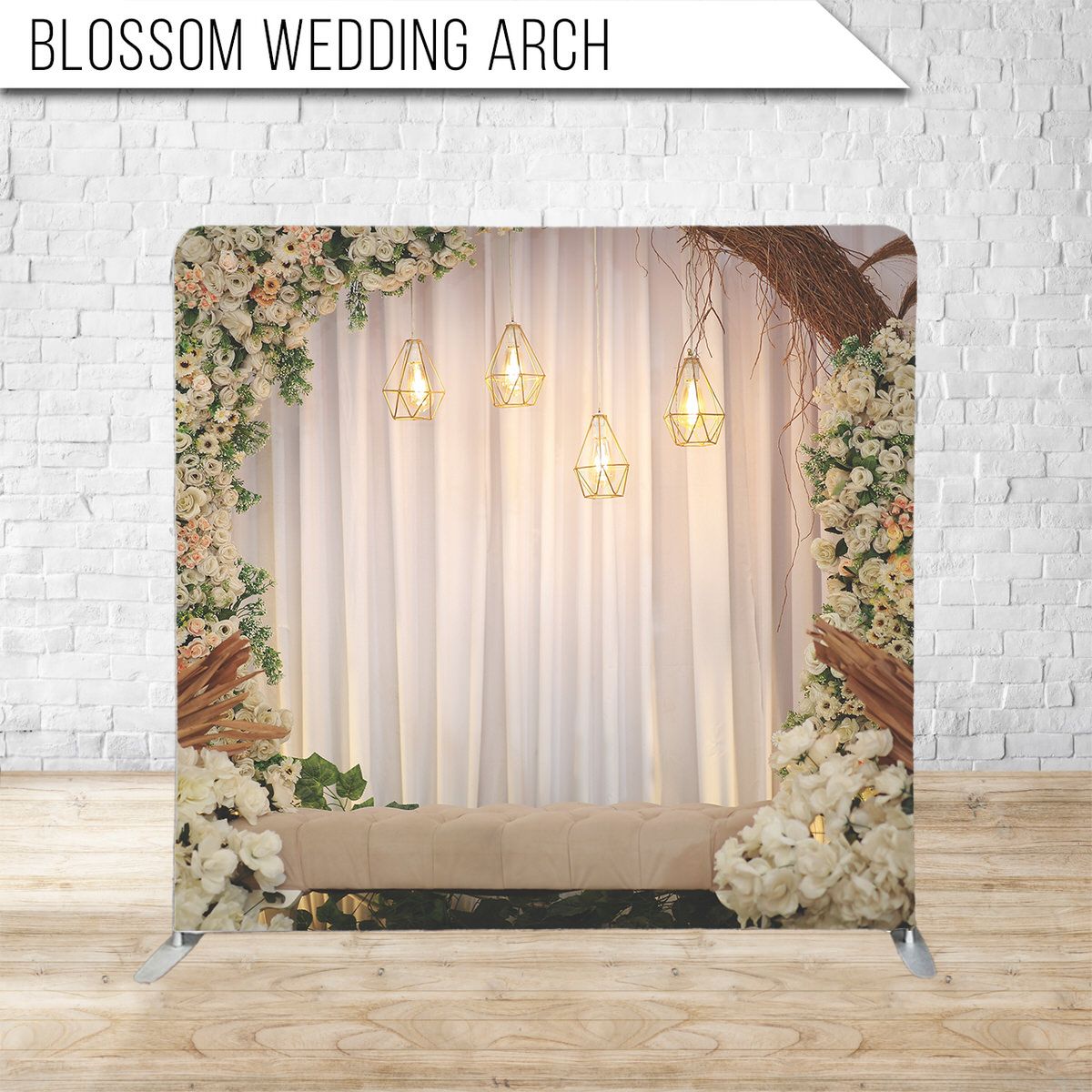 Romantic wedding arch decorated with white flowers, greenery and hanging lanterns against a light backdrop.