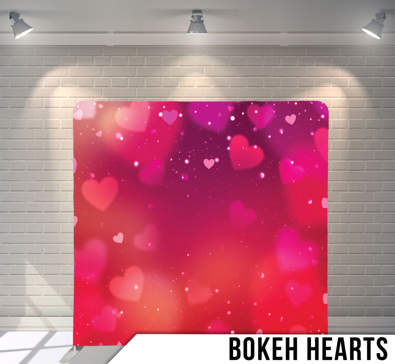Pink and red bokeh background with floating heart shapes and sparkling effects.