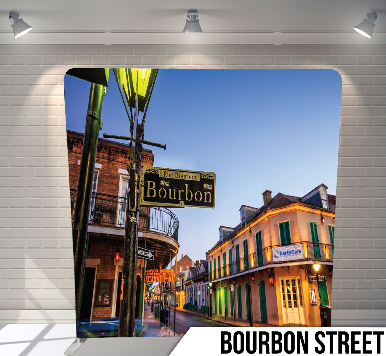 Colorful historic buildings and street sign on iconic Bourbon Street in New Orleans French Quarter.