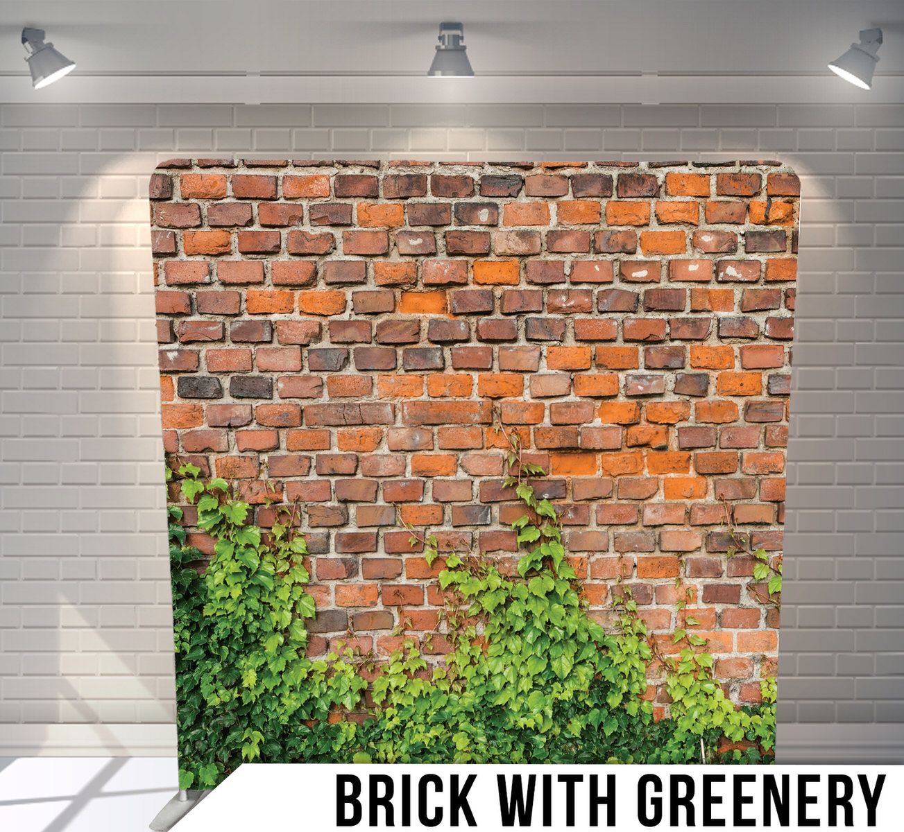 Old red brick wall with green ivy or vines growing up the weathered surface.