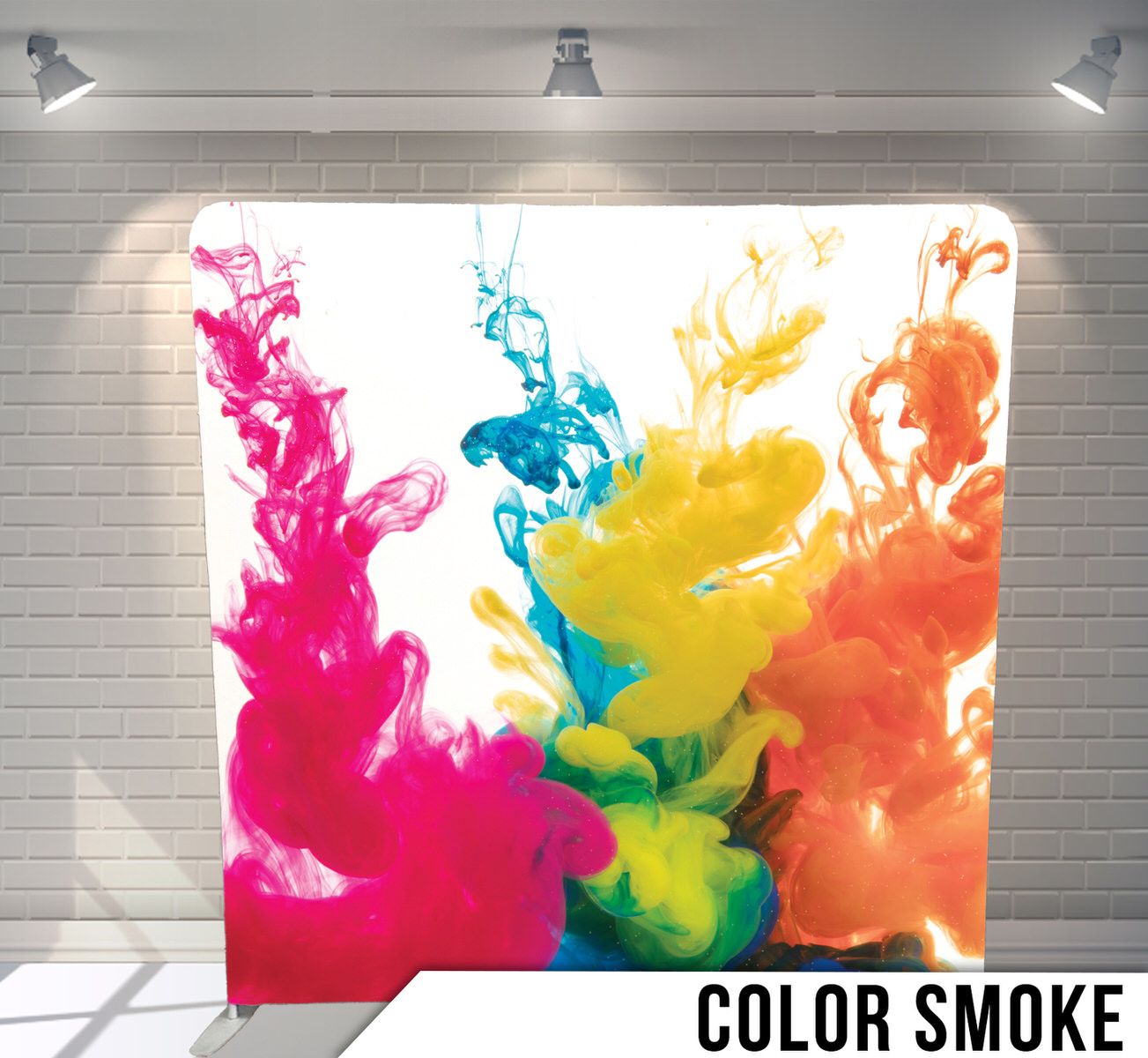 Swirling colorful smoke or ink in pink, blue, yellow, and orange against a white background.