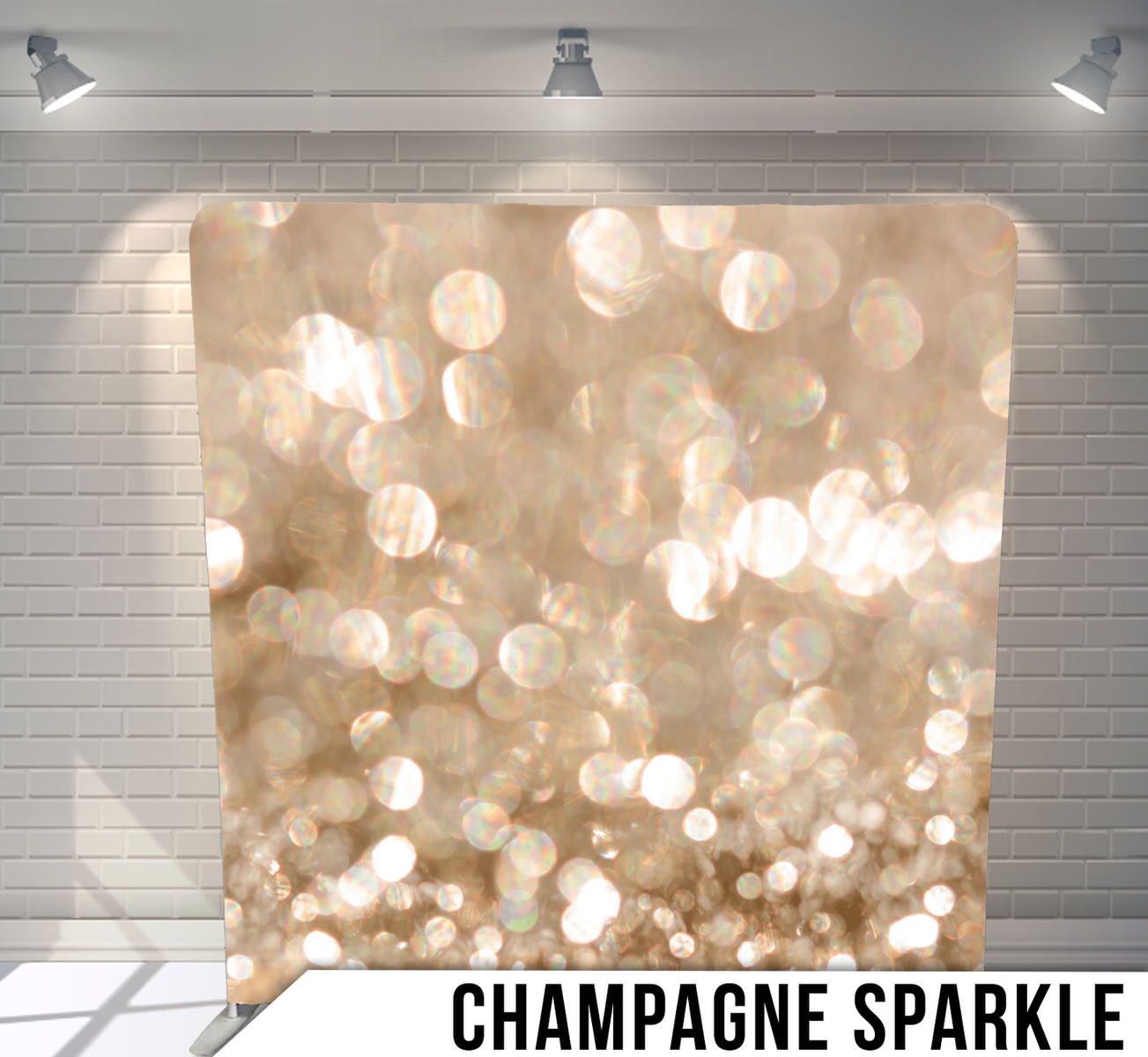 Champagne colored bokeh lights creating a sparkly, festive background effect.