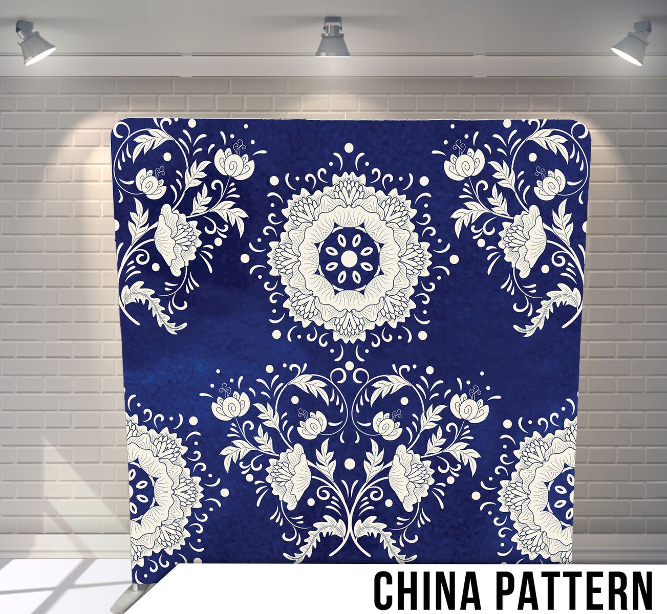 Traditional blue and white floral pattern with ornate circular medallions and delicate flower motifs.