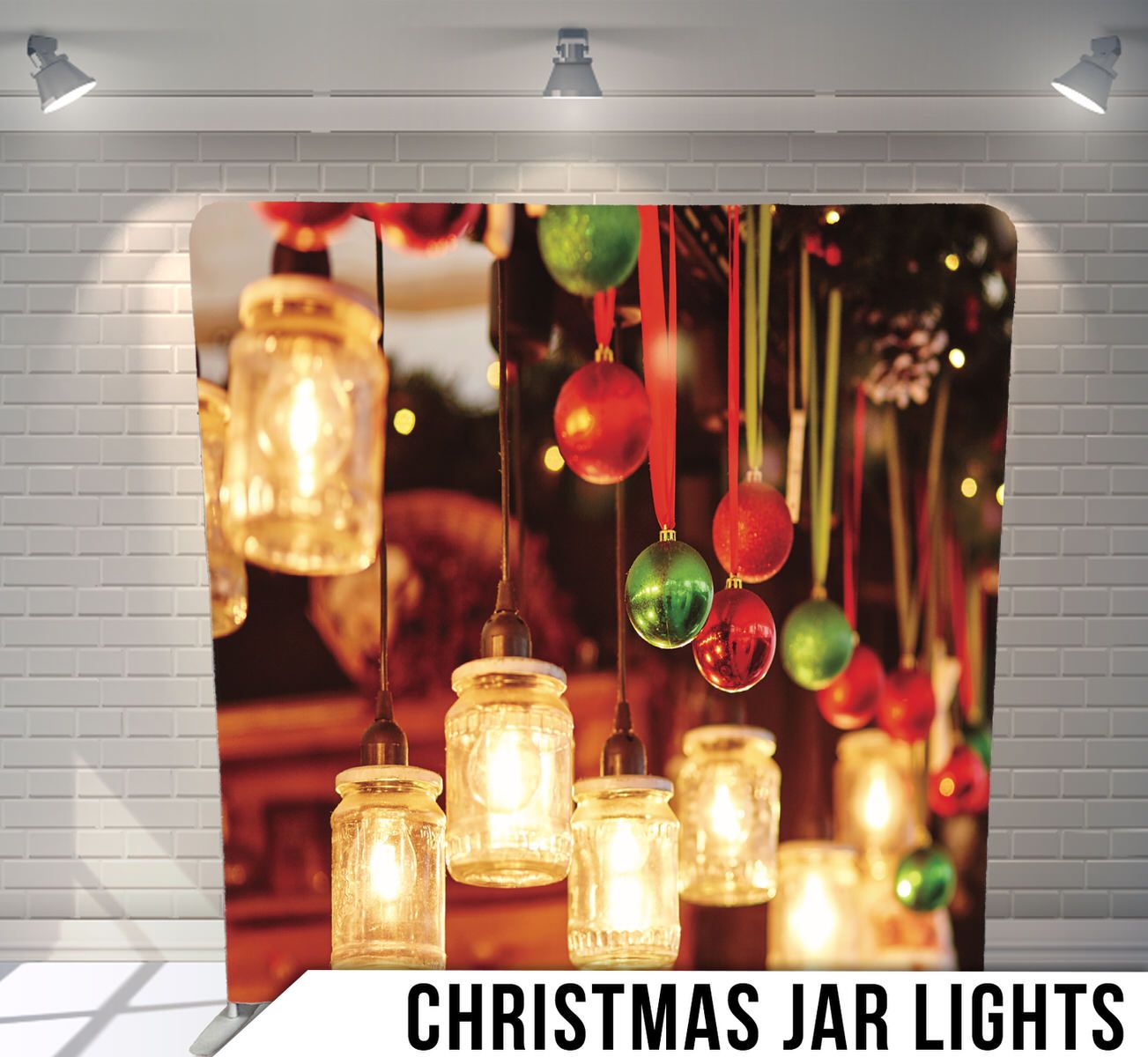 Glowing mason jar lights and colorful ornaments hanging as festive Christmas decorations.