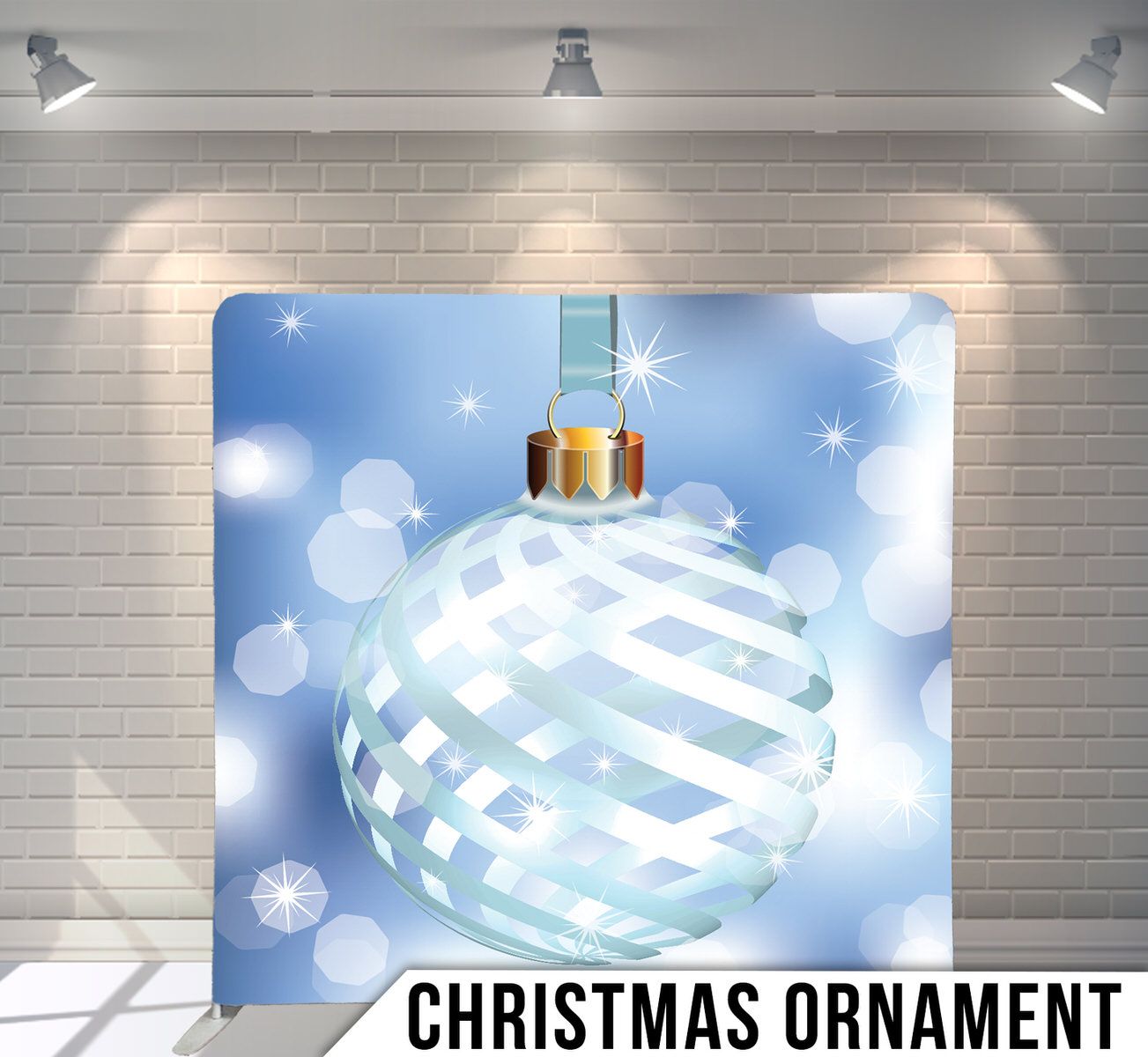 Shimmering blue and white striped Christmas ornament on sparkly bokeh background.