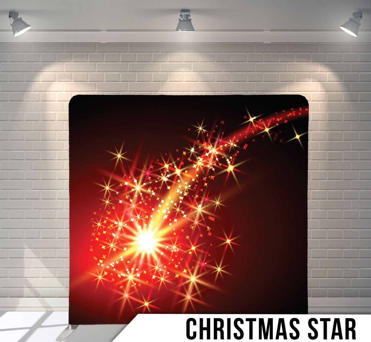 Red and gold sparkling Christmas star burst effect against dark background.