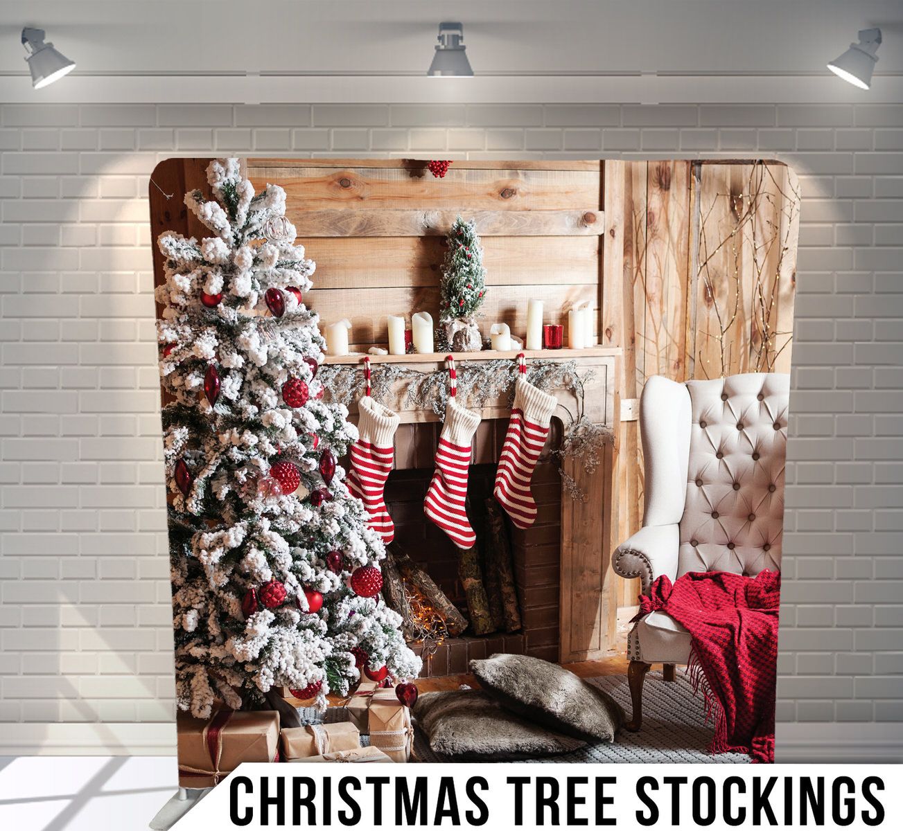 Flocked Christmas tree with red and white striped stockings hanging by a rustic wooden fireplace.