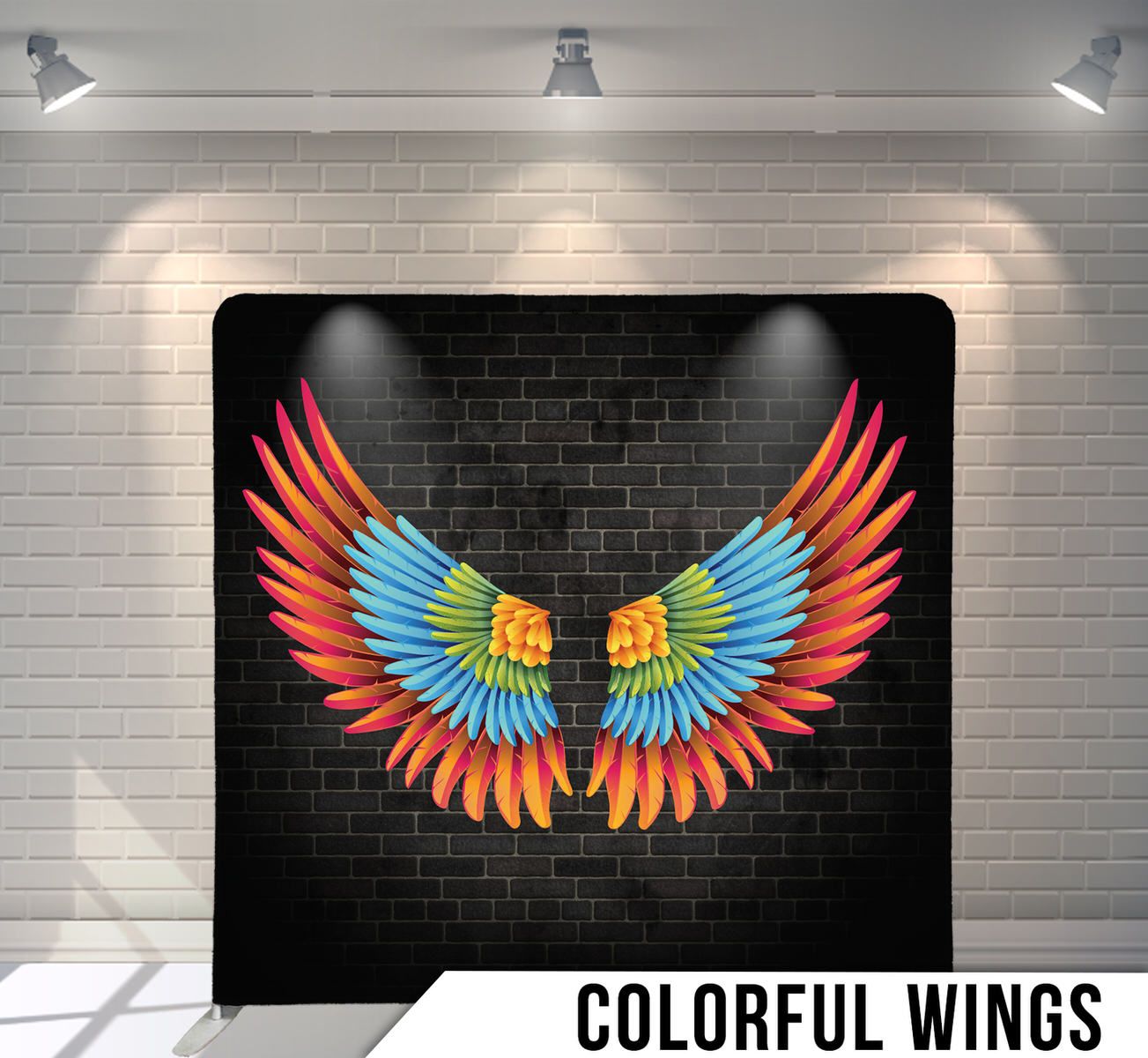 Stylized colorful wing design in red and blue against a black brick wall background.