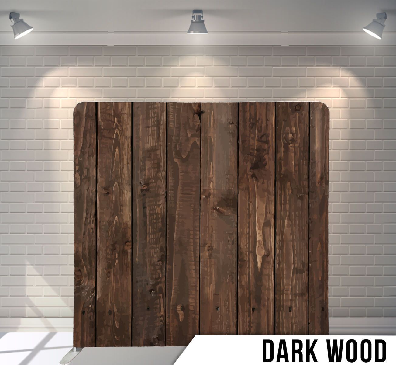 Dark stained wood plank backdrop illuminated by overhead spotlights against white brick wall.