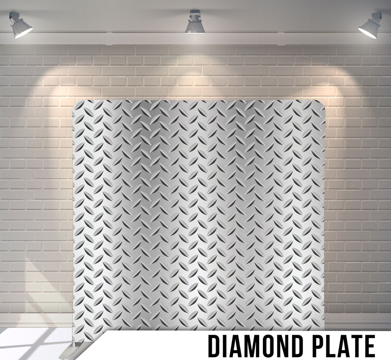 Industrial diamond plate metal texture background with metallic silver finish.