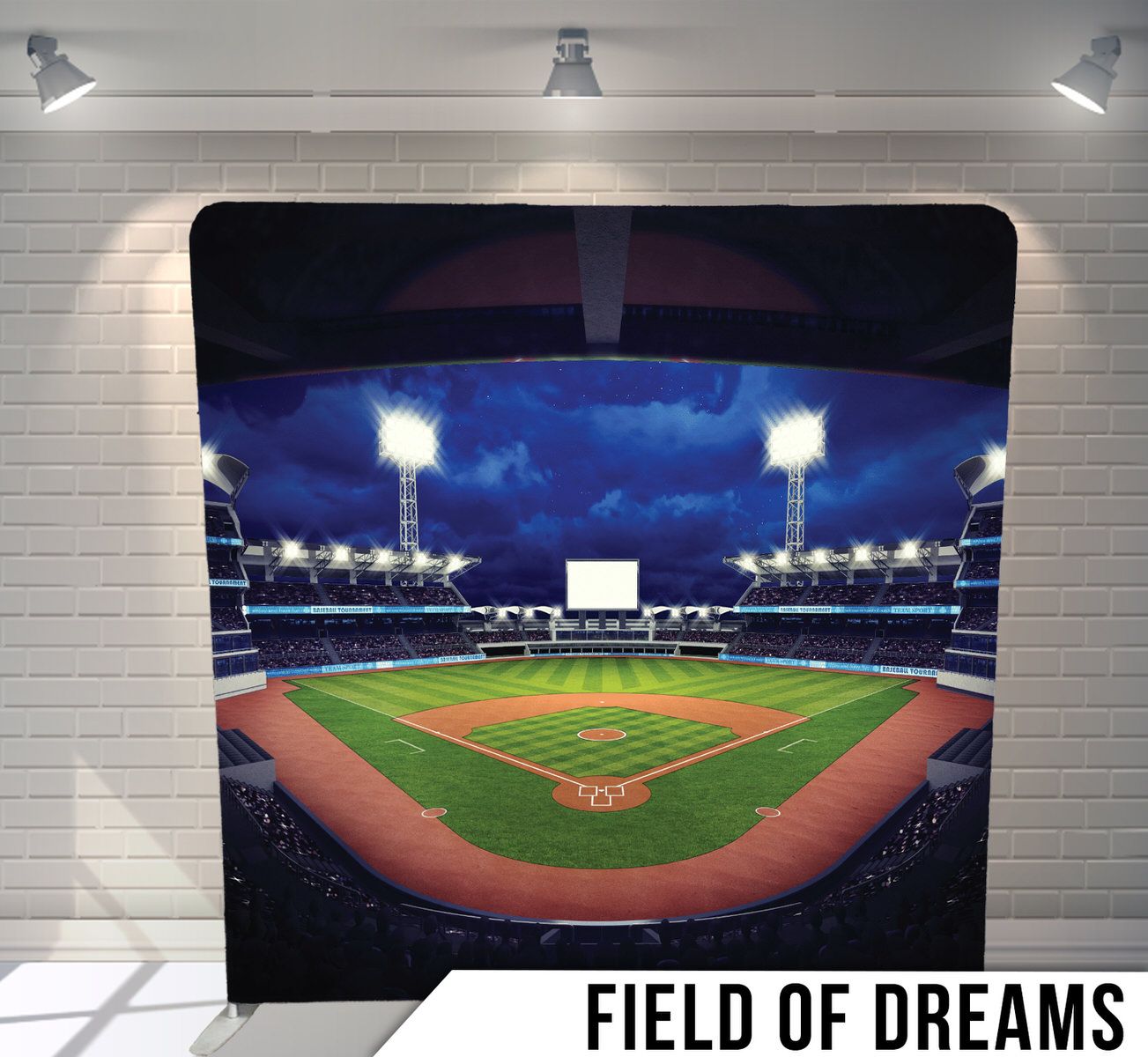Illuminated baseball stadium at night with bright floodlights shining over green field and blue sky above.