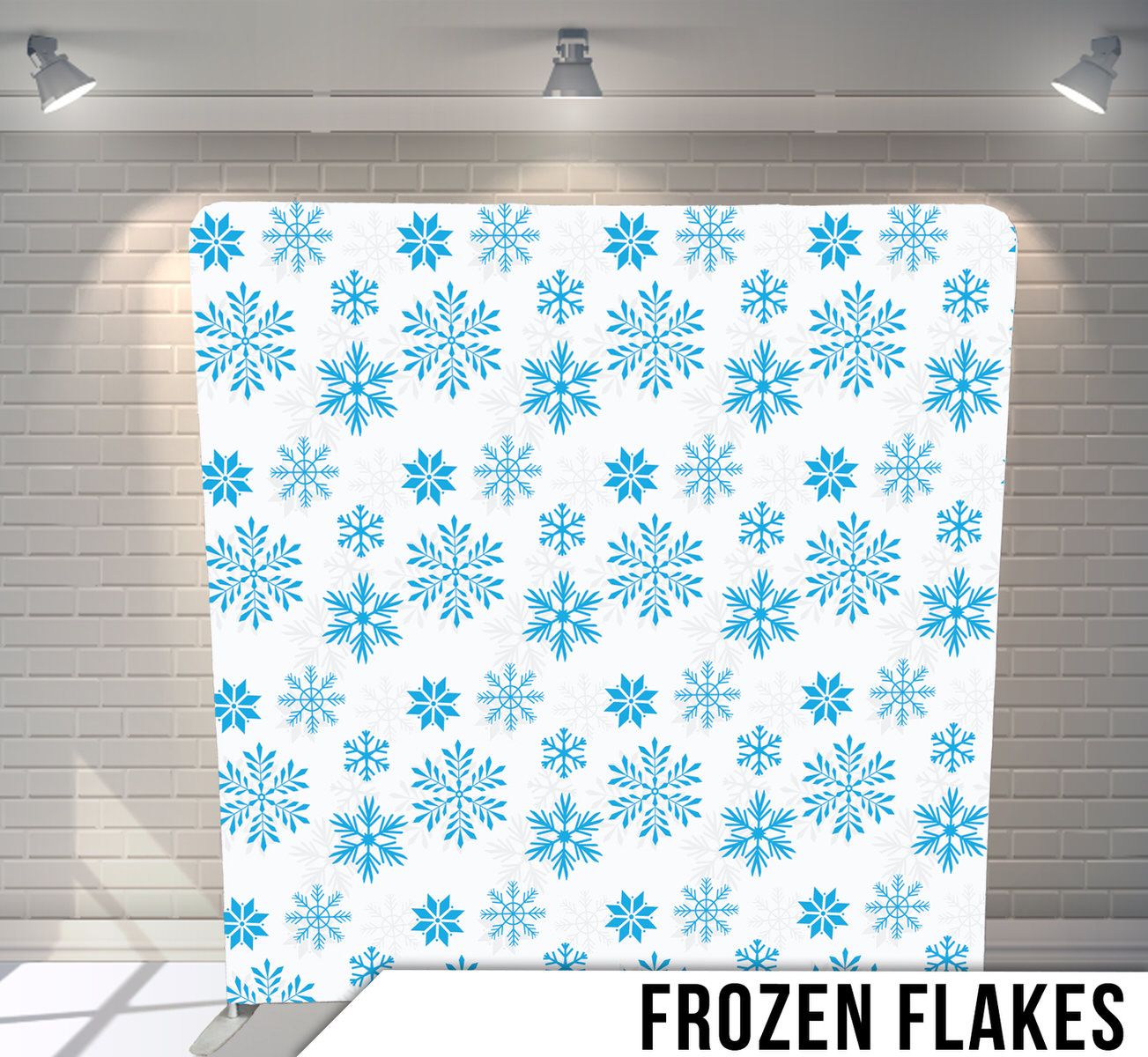 Repeating pattern of blue snowflakes on white background creating a winter themed design.