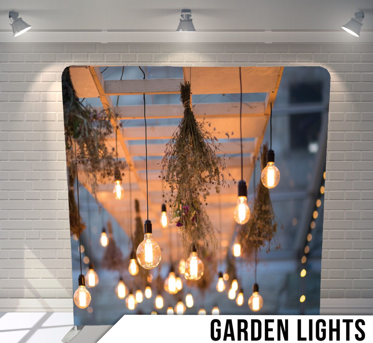 Rustic outdoor scene with hanging edison bulbs and string lights creating warm ambient glow.