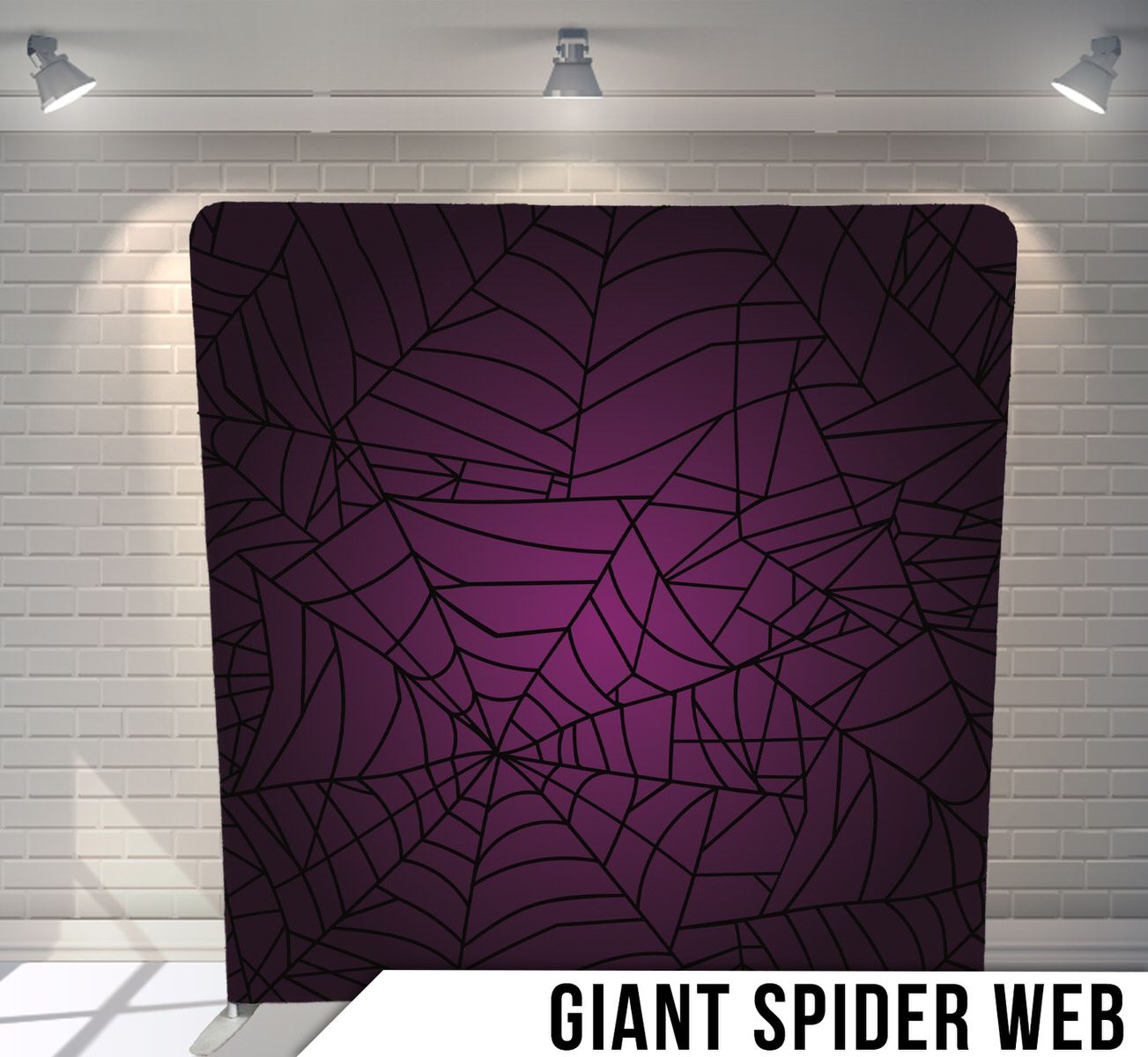 Dark purple spider web pattern design displayed as backdrop against white brick wall.