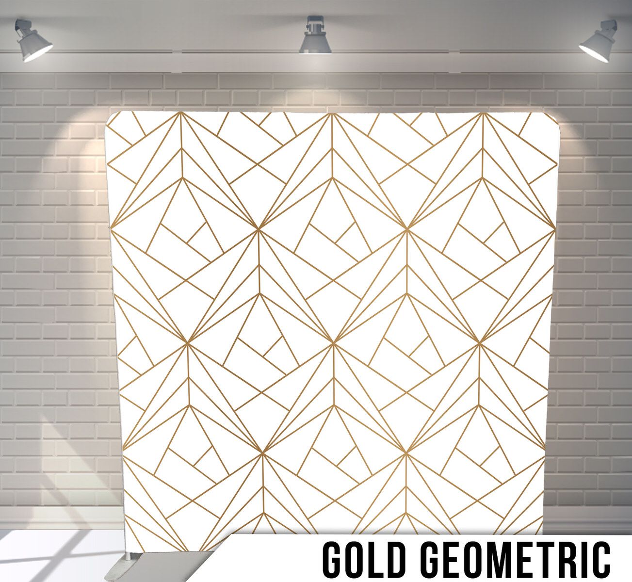 Modern geometric pattern with gold lines forming angular shapes on white background.