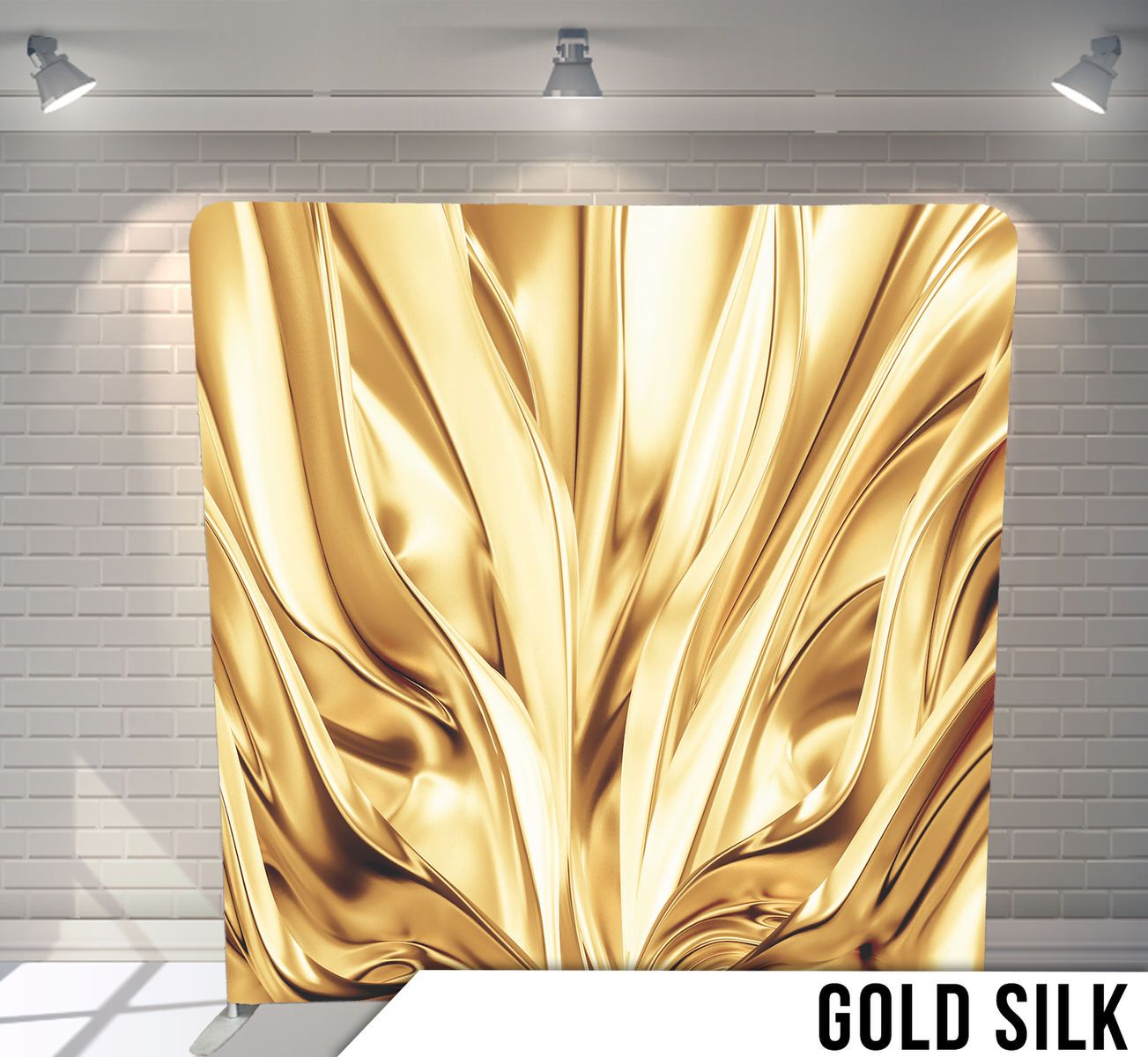 Luxurious gold silk fabric with flowing ripples and folds.