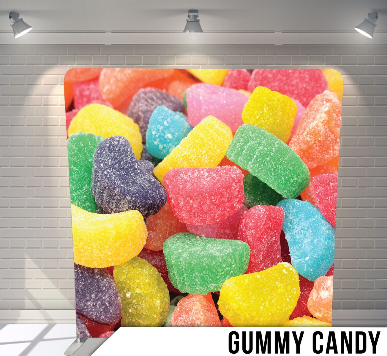 Colorful sugar-coated gummy candies in various shapes and bright colors displayed on white background.