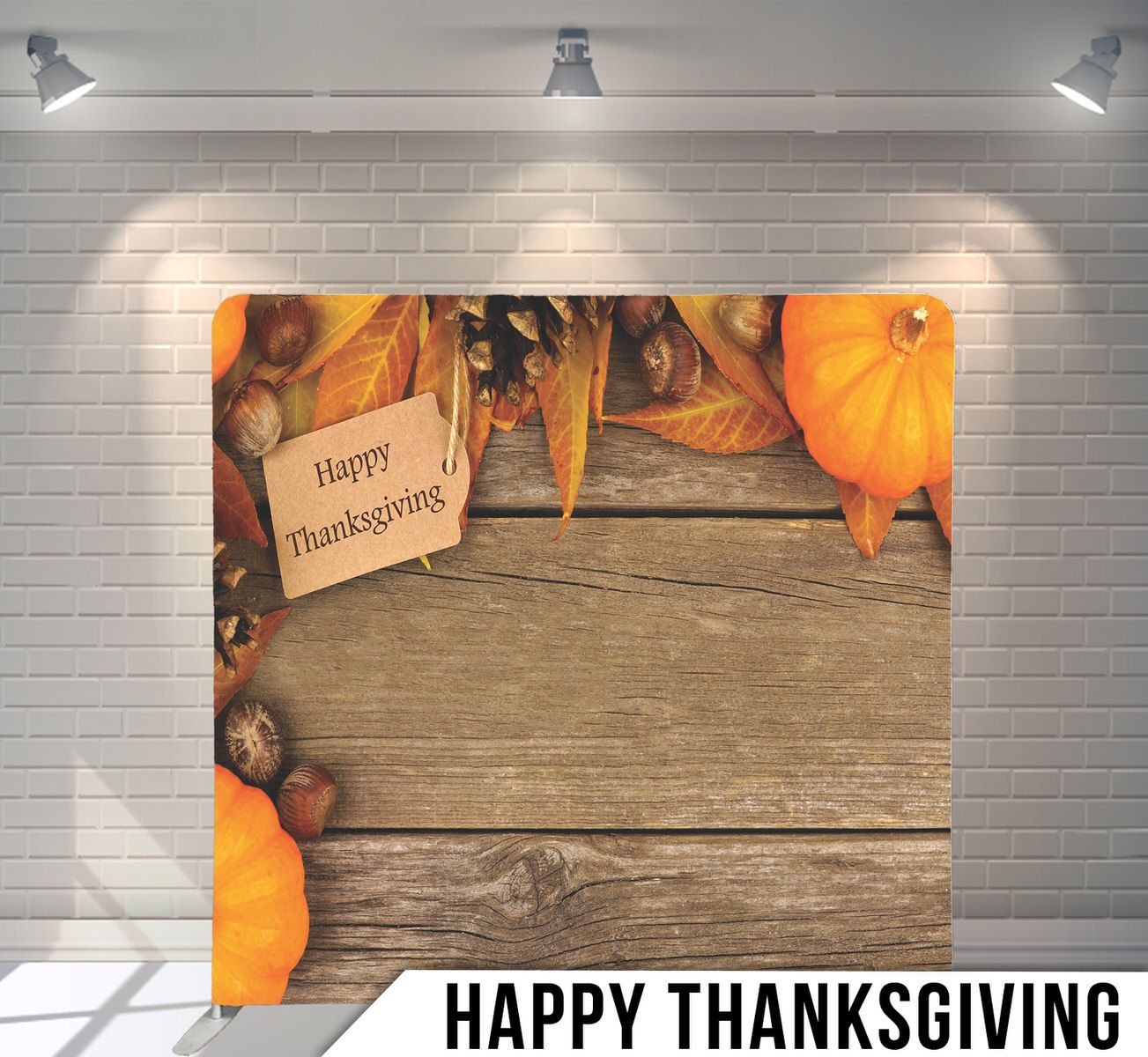 Rustic wooden background with pumpkins and Happy Thanksgiving tag for holiday decoration.