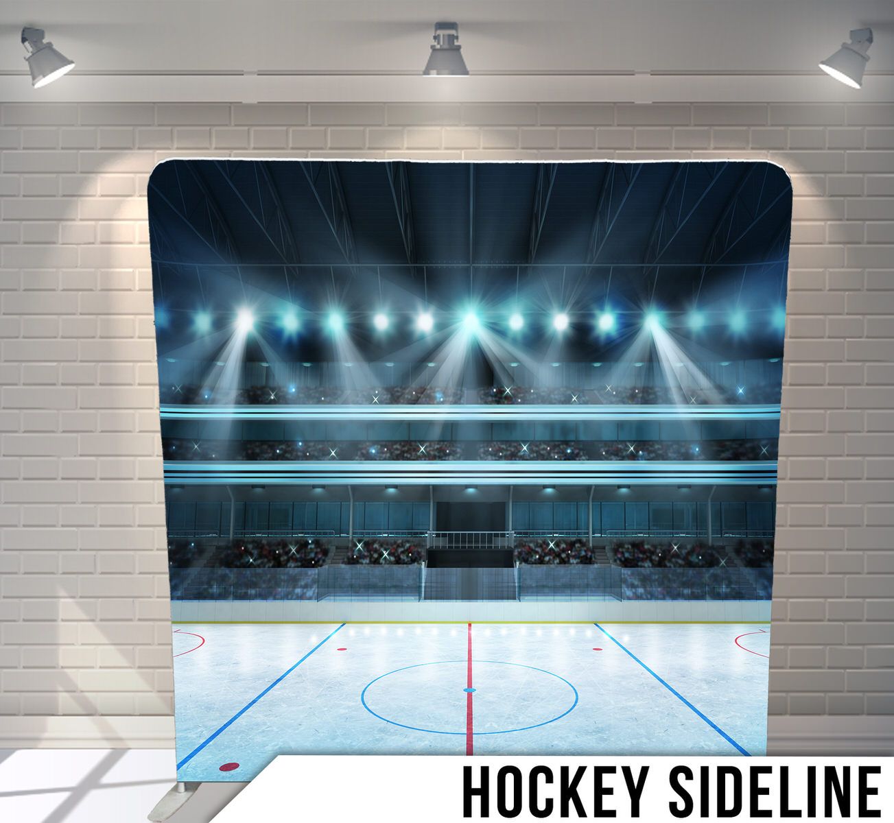 Illuminated hockey arena with bright spotlights shining over empty ice rink from sideline perspective.