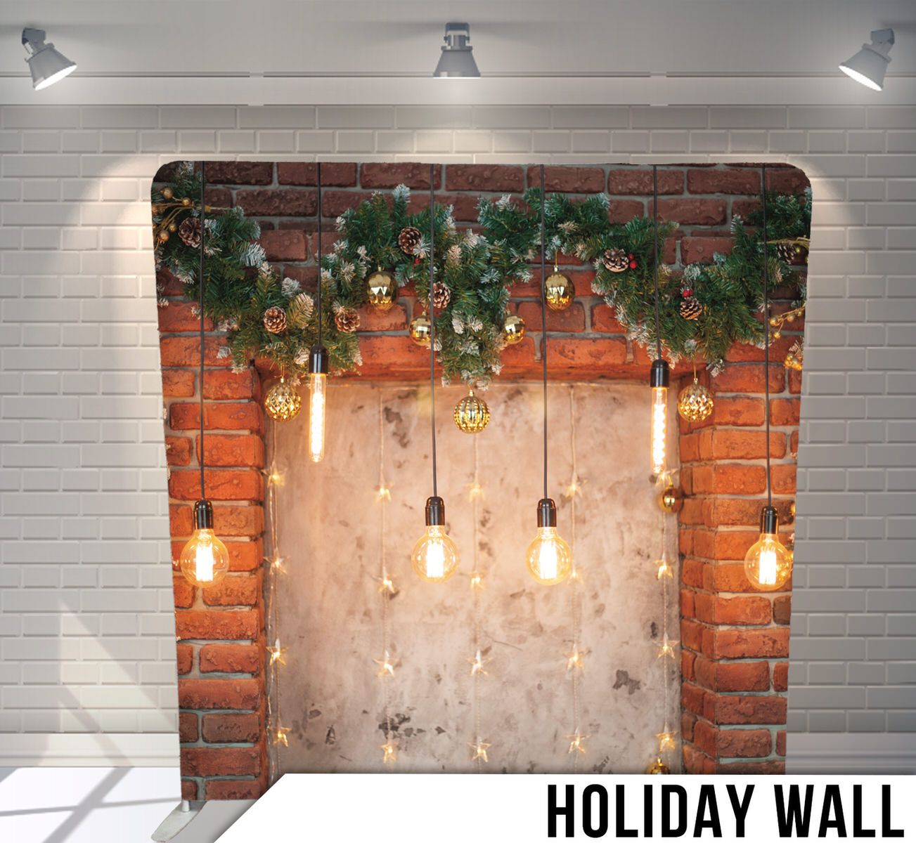 Exposed brick wall with hanging greenery and vintage Edison bulb lights creating cozy holiday atmosphere.