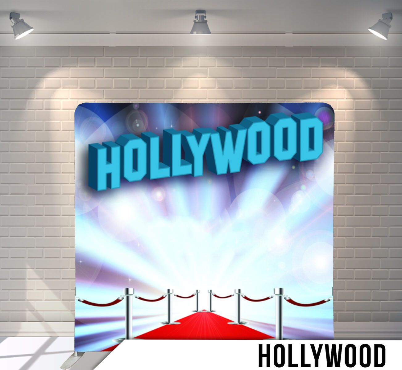 Hollywood backdrop featuring blue illuminated text with red carpet and stanchion ropes.