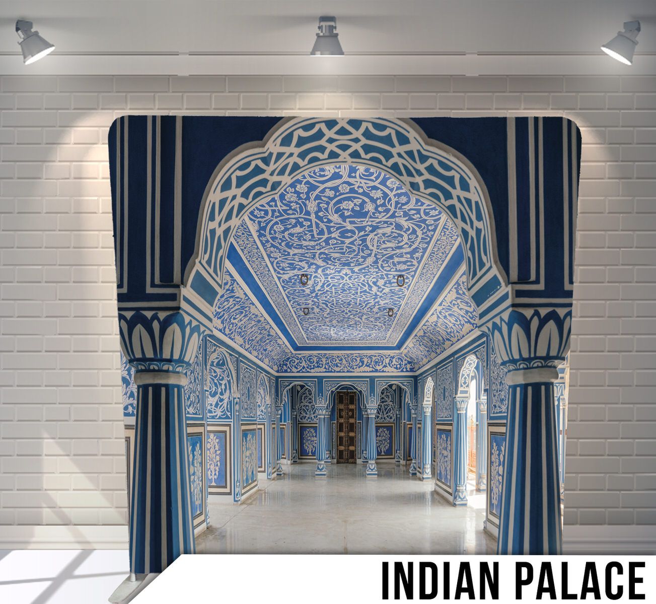 Ornate blue and white palace interior with intricate ceiling designs and architectural details.