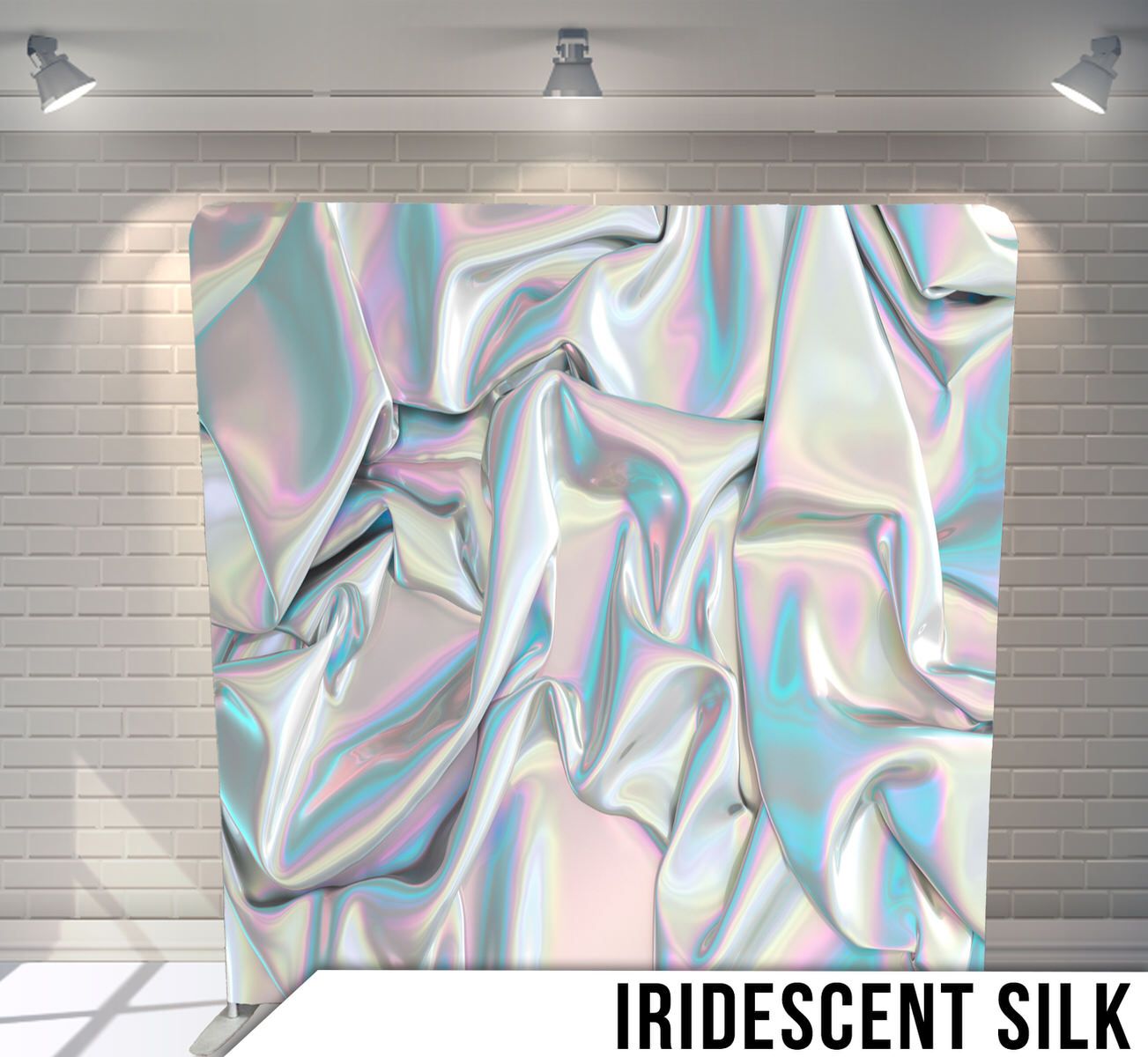 Holographic iridescent fabric texture with shimmering pastel colors and rippled surface.