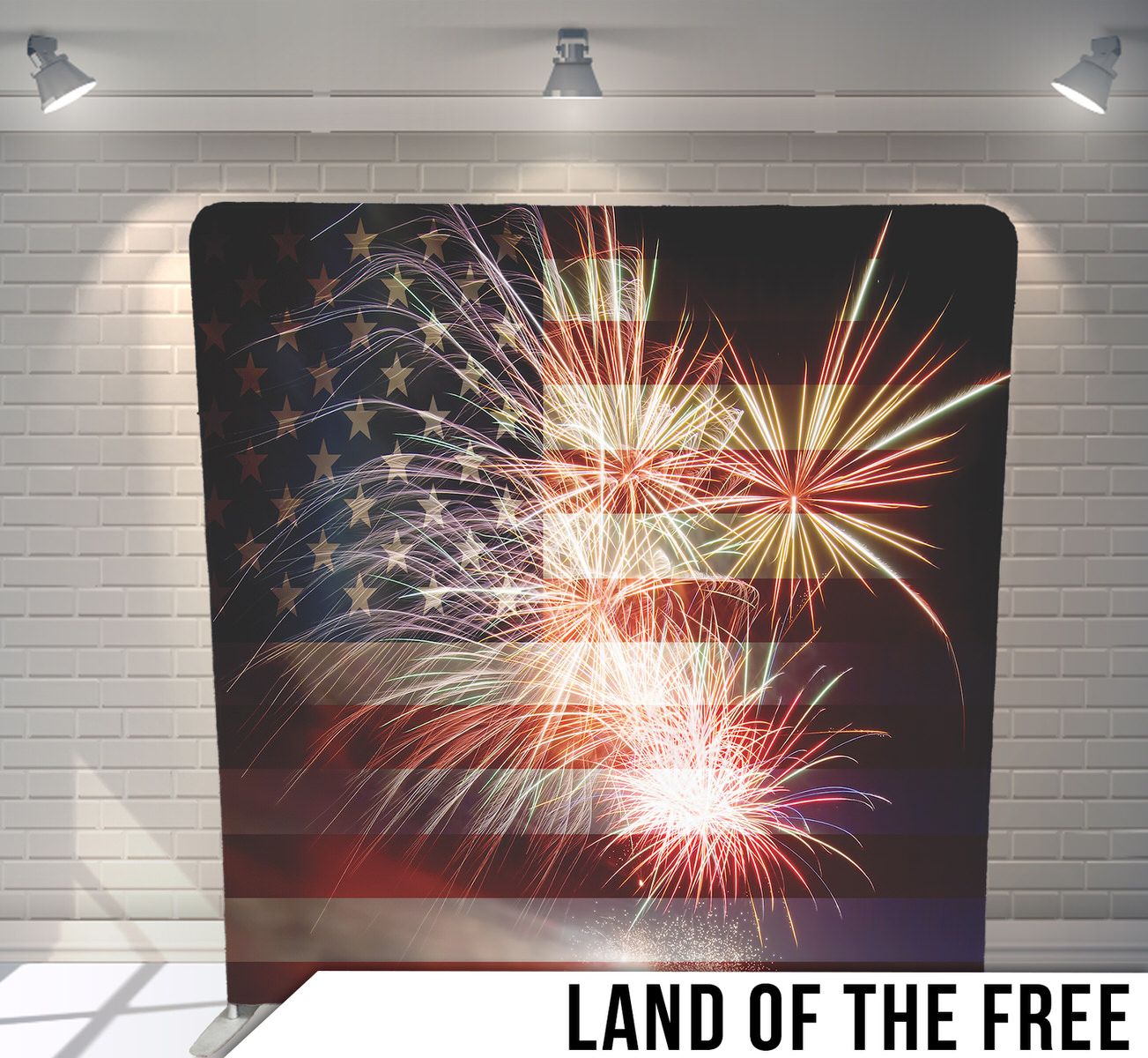 Fireworks display with American flag colors bursting against dark night sky.