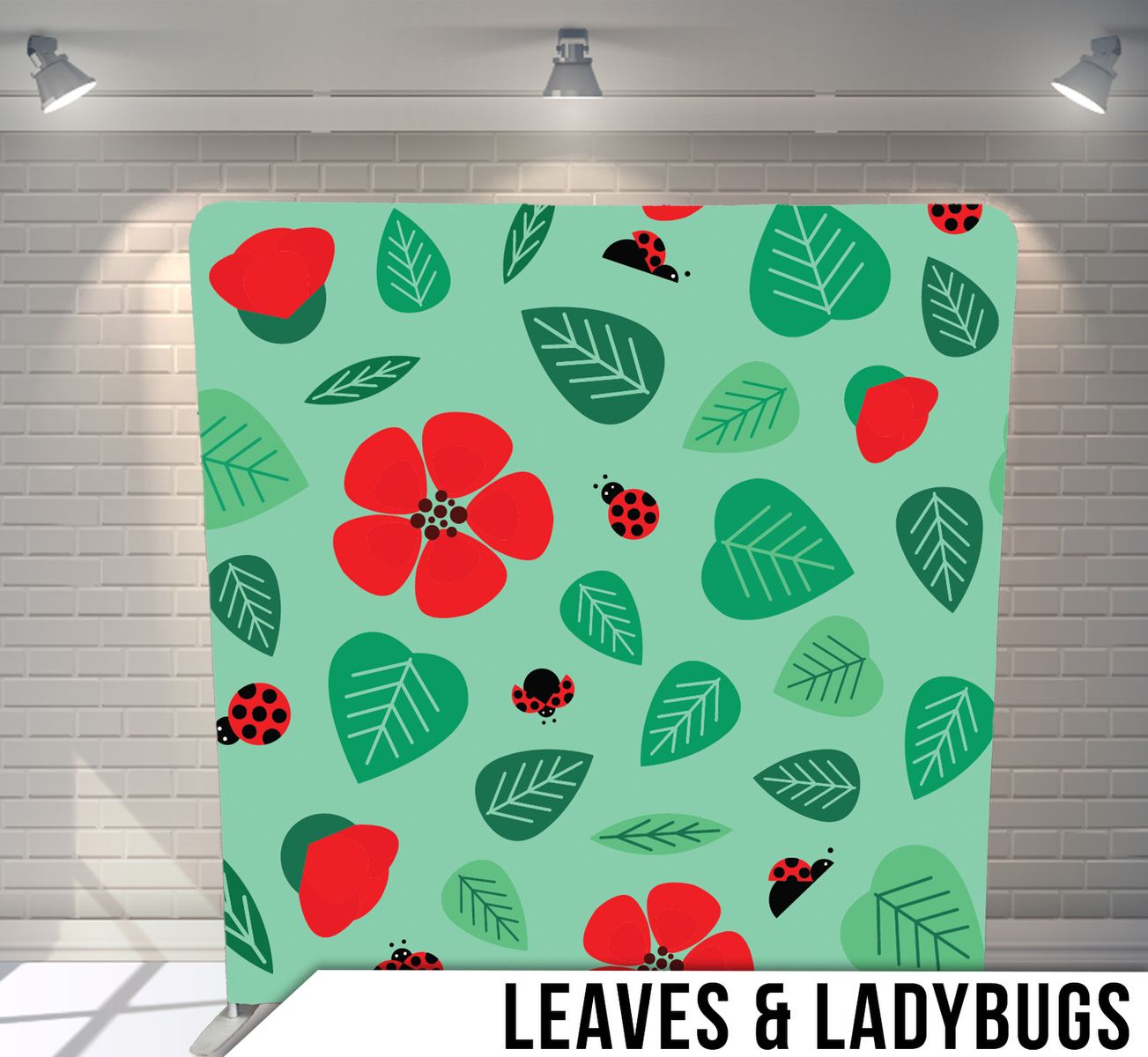 Playful pattern design featuring red flowers, green leaves, and ladybugs on a mint green background.