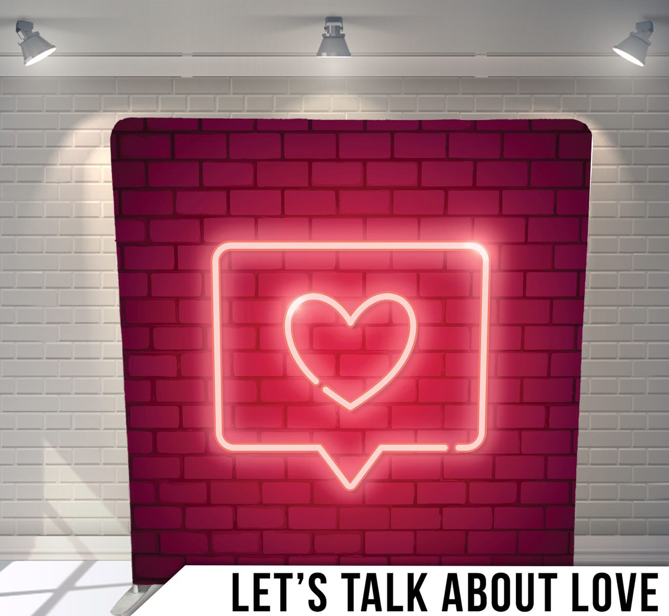 Neon heart message bubble on red brick wall background.