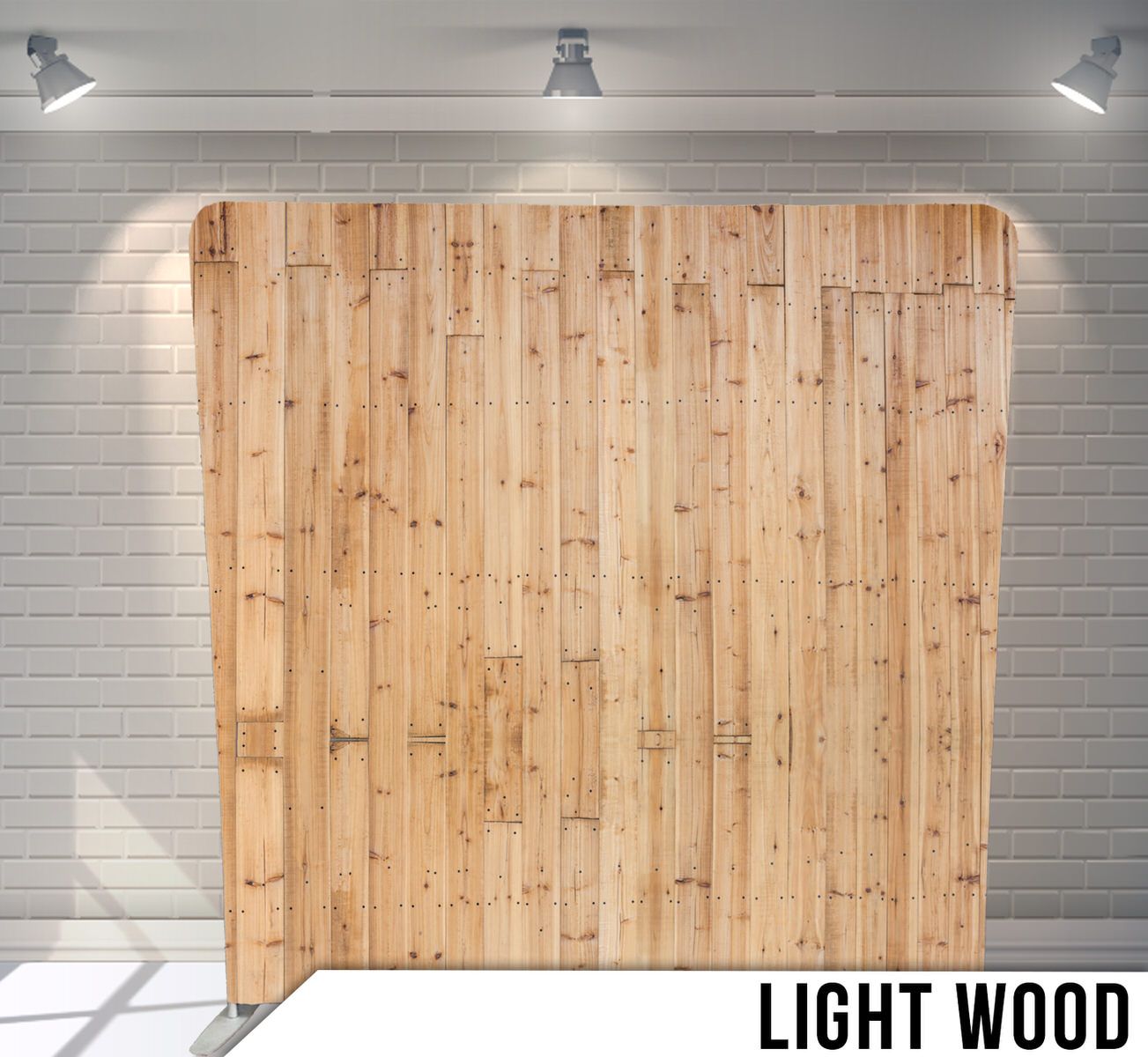 Natural light wood paneling backdrop with vertical planks under spotlights.